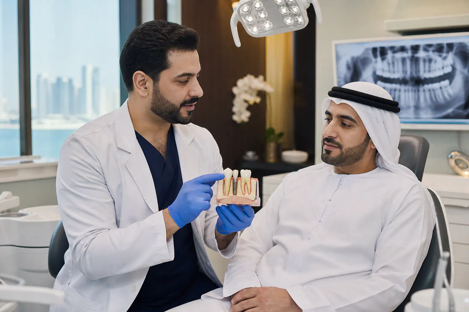 Immediate implant consultation after extraction — dentist with a patient at AHLI Specialists Medical Center, Al Shamkha Center