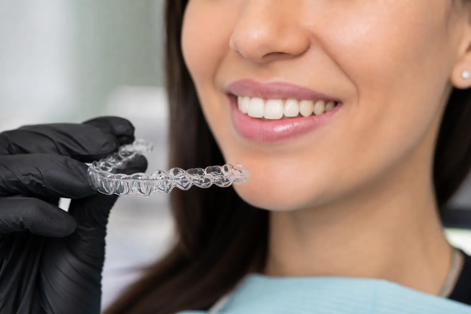 Transparent braces to treat erupted teeth - Al Shamkha
